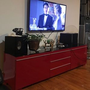 Tv table storage glass top.  In good condition